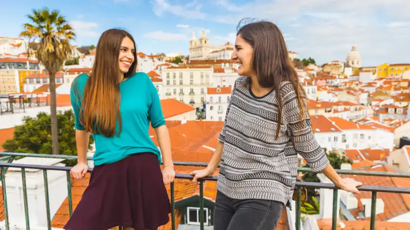 happy girls enjoying beautiful view lisbon scaled.jpg
